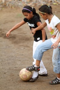 Villa Esperanza girls playing soccer